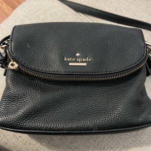 Kate Spade small black purse. Used in fair condition.